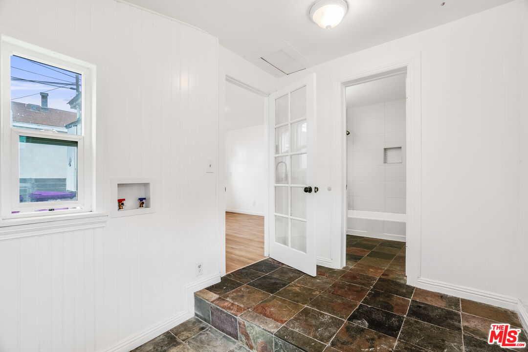 312 East Peace Street Long Beach, CA 90805 - Photo 13 of 39 a bedroom with a bed and a window