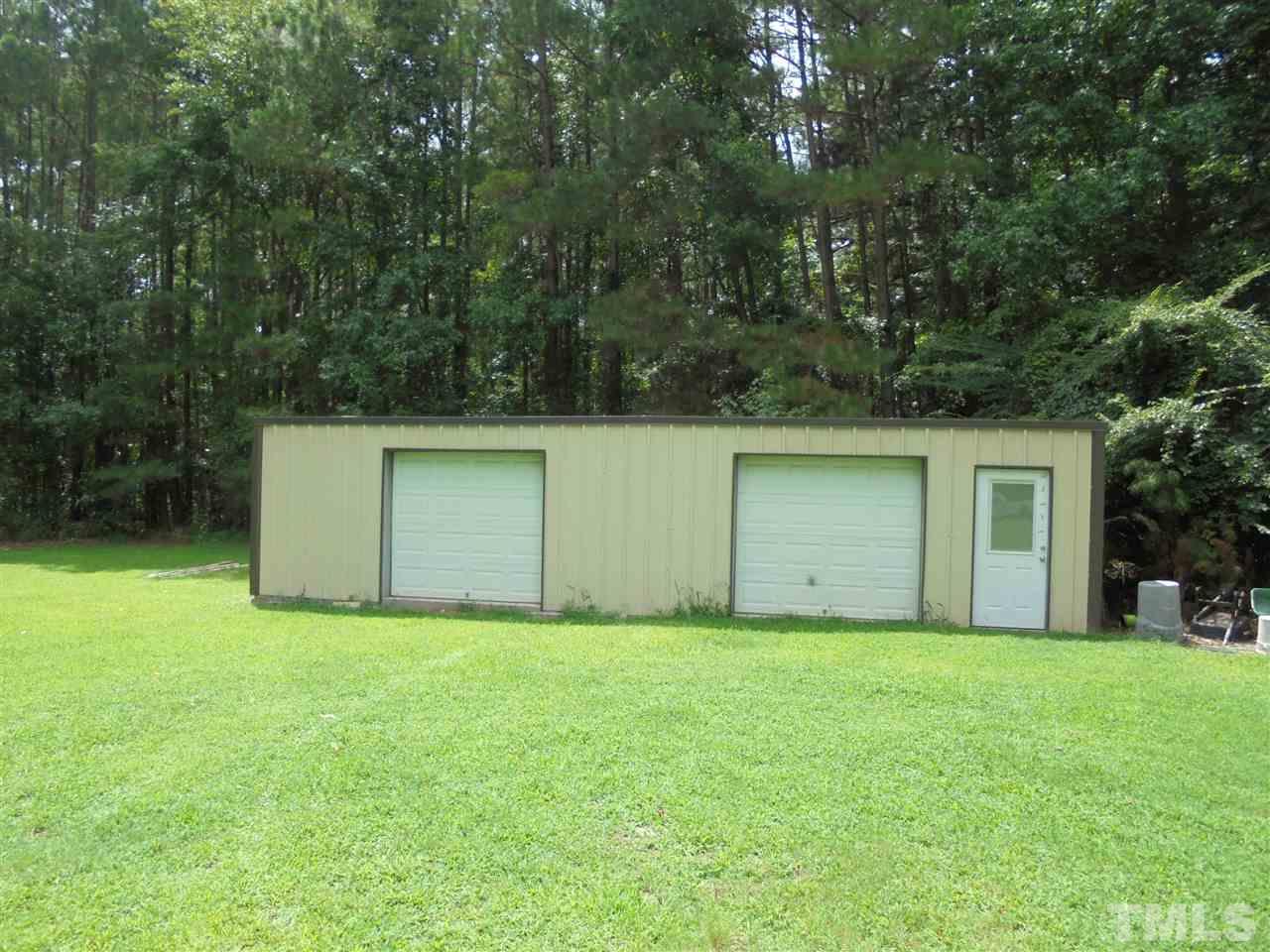182 Dyking Road Louisburg, NC 27549 - Photo 21 of 25 You'll find plenty of room to storage just about anything you have in this large metal building. Could be used as a detached garage! This building has a concrete floor and is NOT wired with electricity! The dimensions of this building area approx. 39x15!