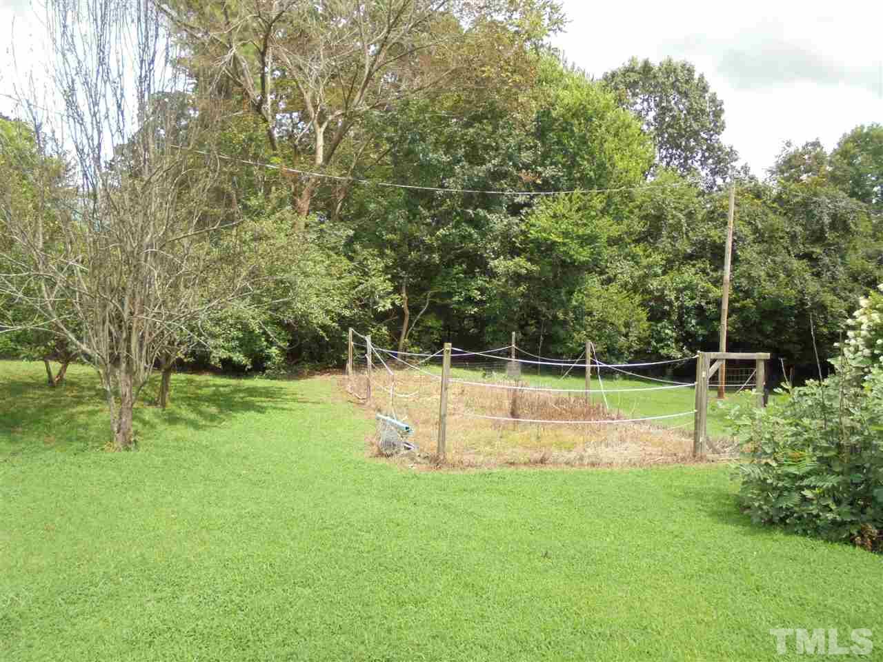 182 Dyking Road Louisburg, NC 27549 - Photo 24 of 25 Garden area already has some fencing up to keep the pests out of your vegetables!