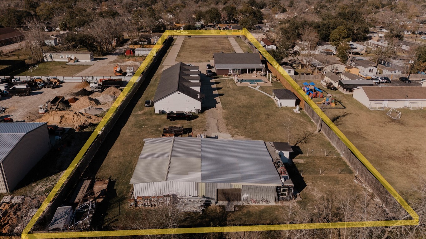 918 Fresa Road Pasadena, TX 77502 - Photo 3 of 47 This property features a large, fenced lot with multiple outbuildings and a spacious yard. It includes a pool and ample space for outdoor activities. Ideal for those seeking privacy and versatile use of space.