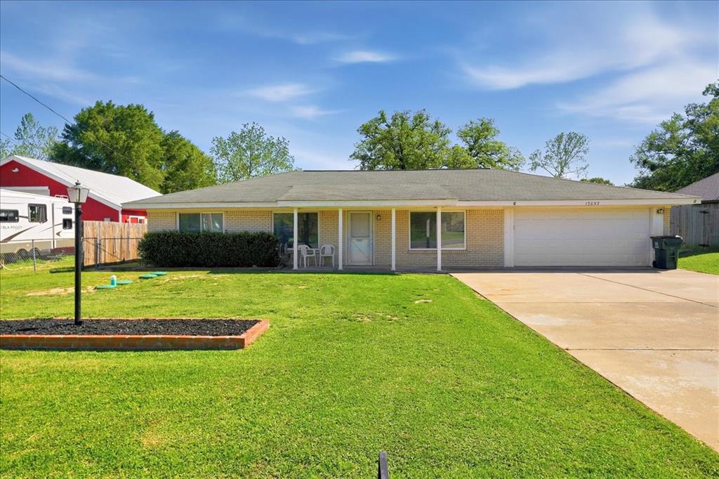 12657 Alma Street Tyler, TX 75704 - Photo 1 of 36 a view of a house with a backyard