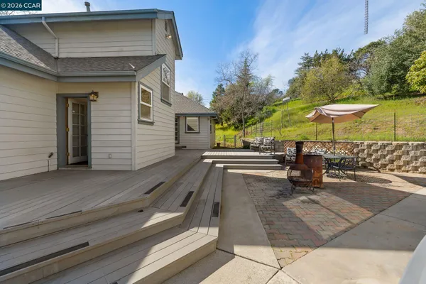 a house view with a garden space