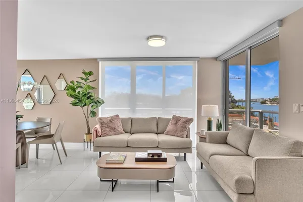 a living room with furniture and a table
