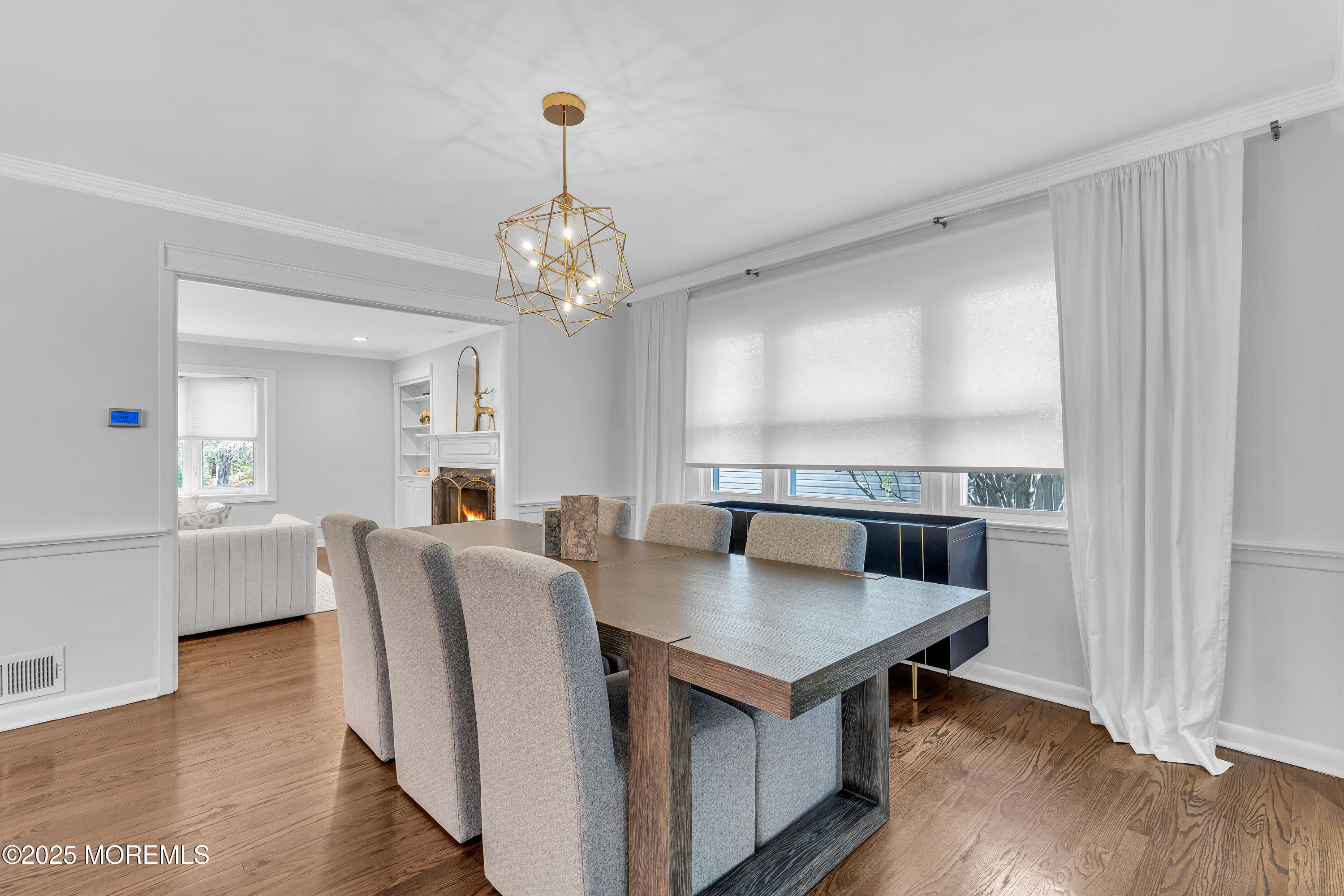 67 Beverly Road Springfield, NJ 07081 - Photo 11 of 46 a view of kitchen and dining area with wooden floor