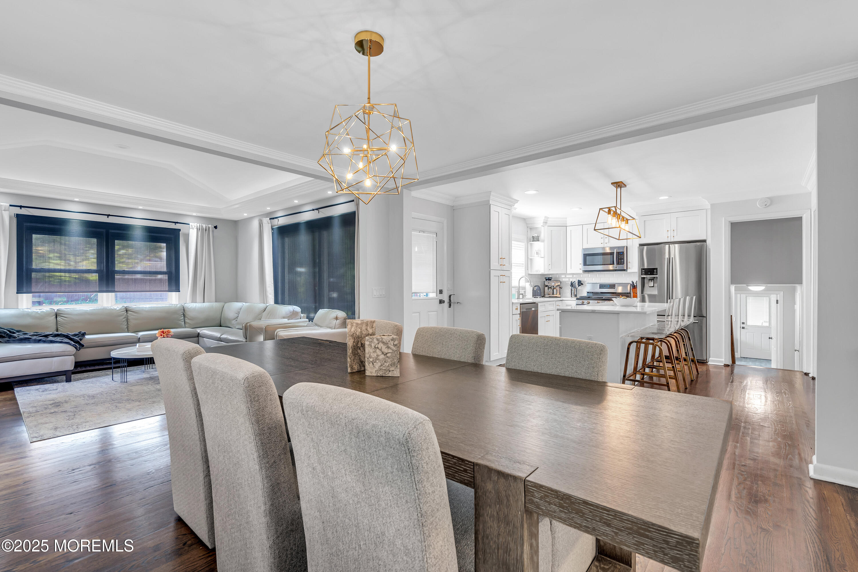 67 Beverly Road Springfield, NJ 07081 - Photo 13 of 46 a view of a dining room with furniture and wooden floor