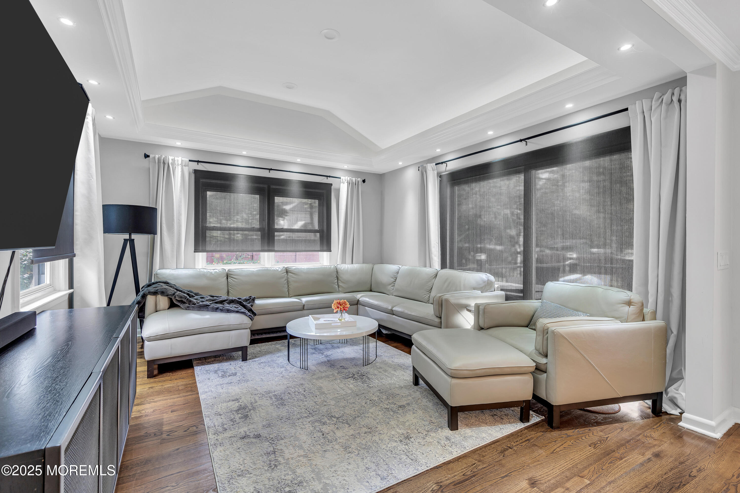 67 Beverly Road Springfield, NJ 07081 - Photo 14 of 46 a living room with furniture and a large window
