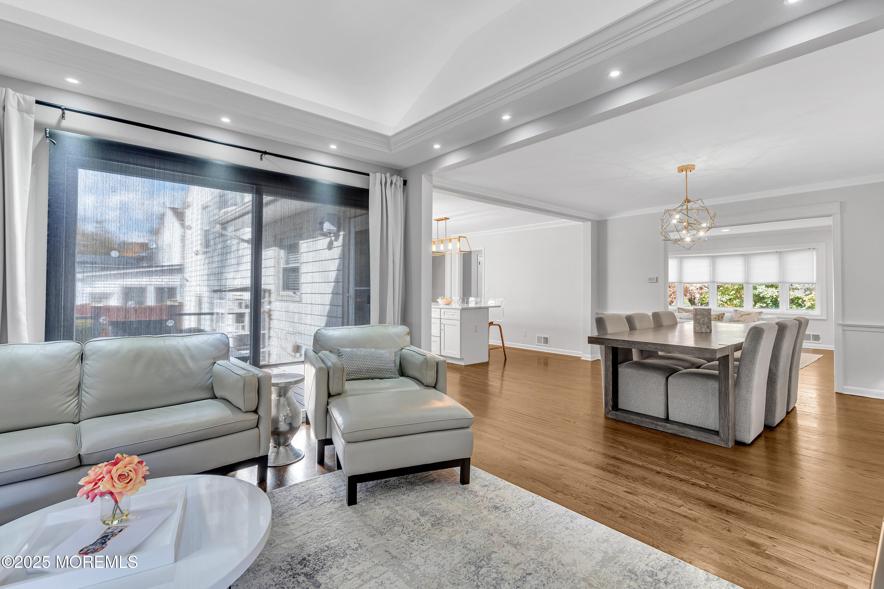 67 Beverly Road Springfield, NJ 07081 - Photo 16 of 46 a living room with furniture and a large window