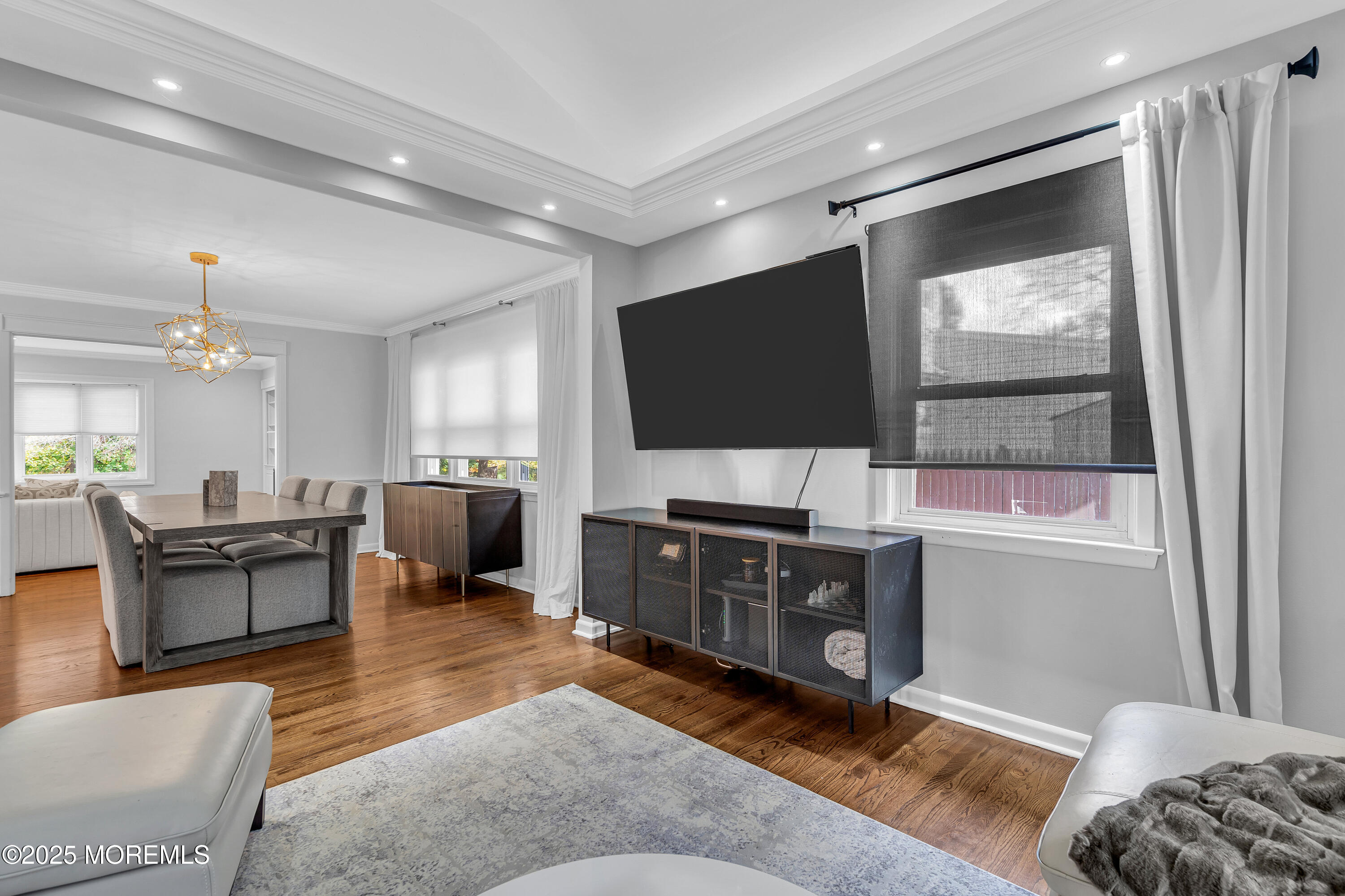 67 Beverly Road Springfield, NJ 07081 - Photo 17 of 46 a living room with furniture and a flat screen tv