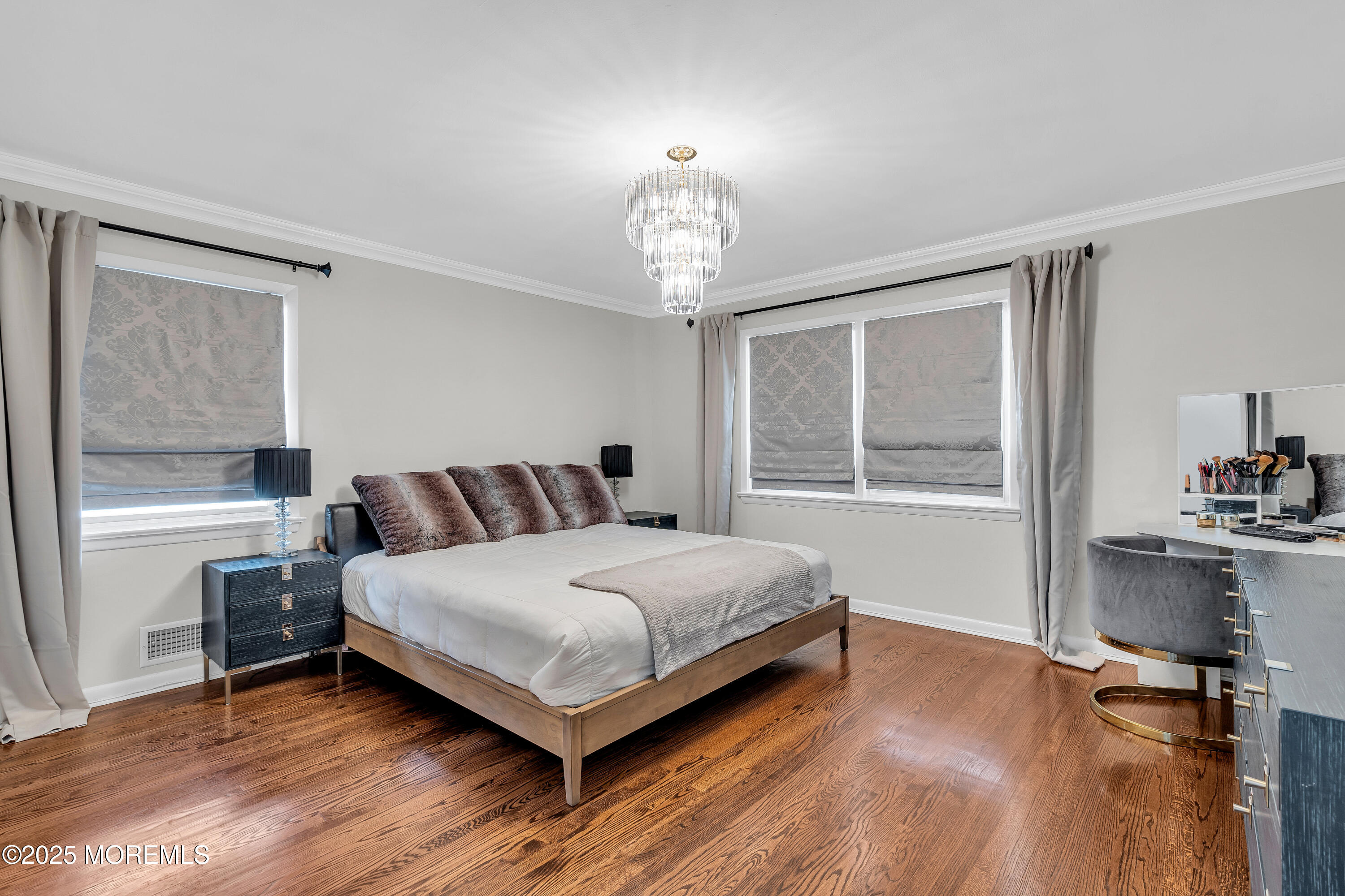 67 Beverly Road Springfield, NJ 07081 - Photo 24 of 46 a spacious bedroom with a bed and a window