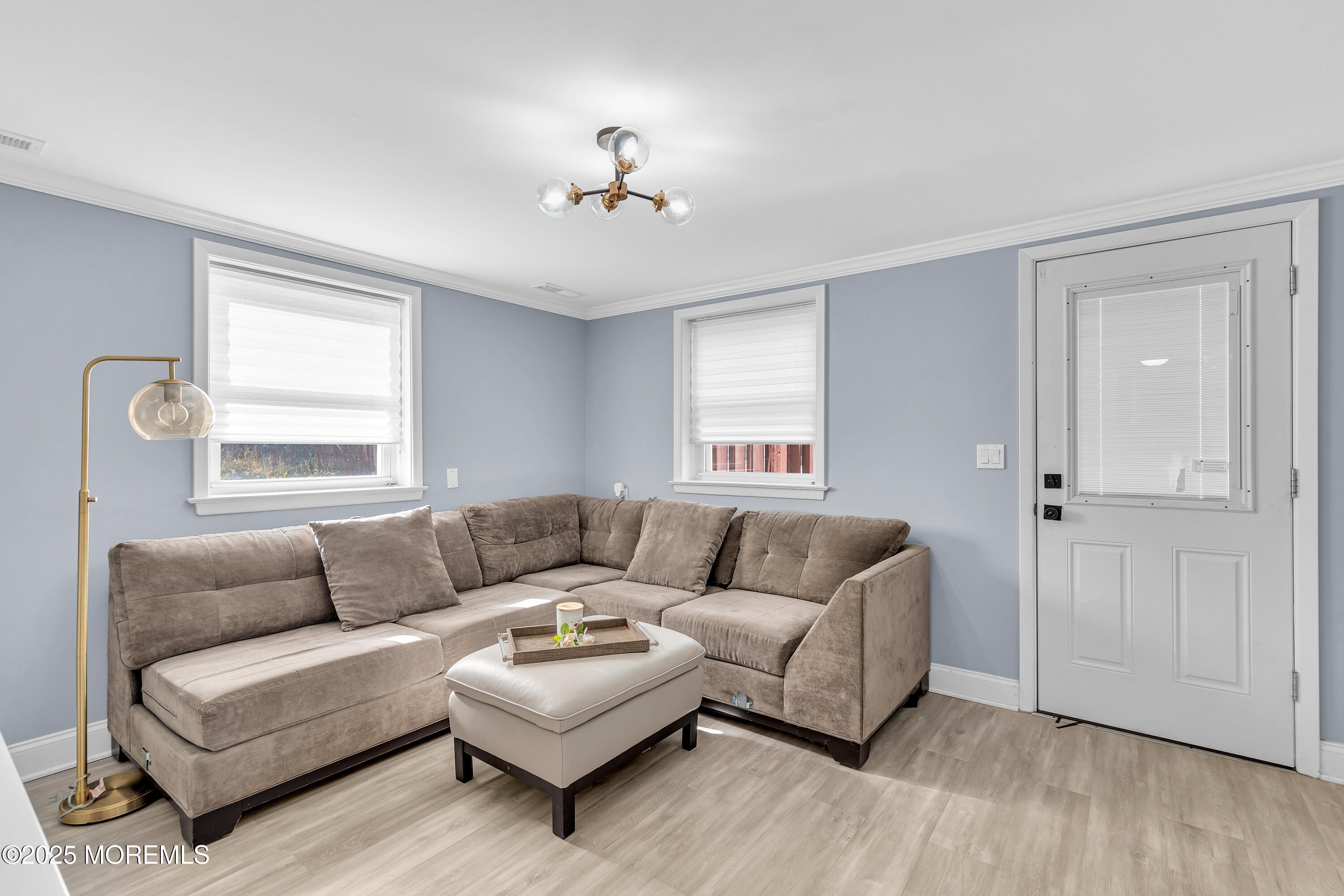67 Beverly Road Springfield, NJ 07081 - Photo 31 of 46 a living room with furniture and a window