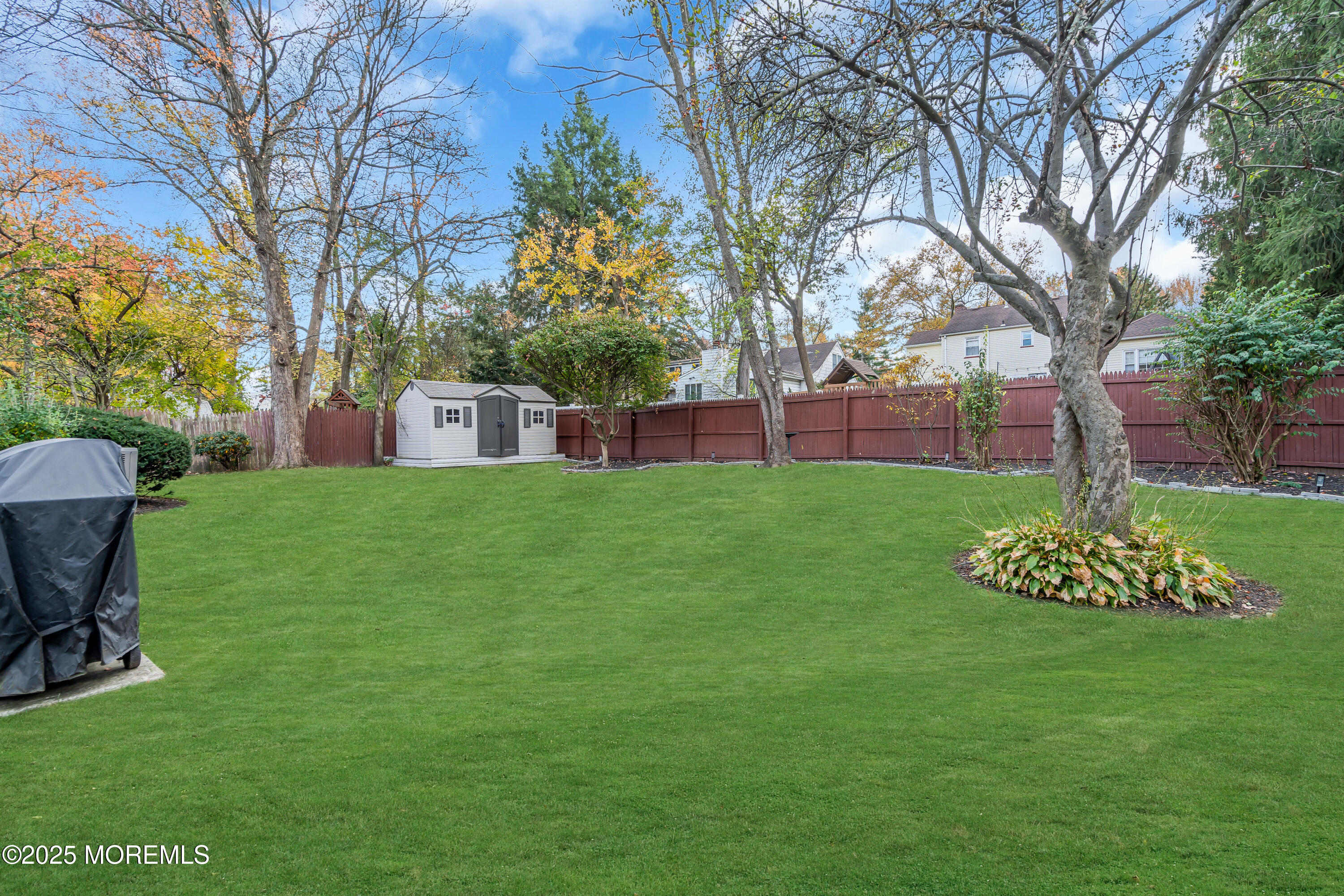 67 Beverly Road Springfield, NJ 07081 - Photo 41 of 46 a house view with a sitting space and garden