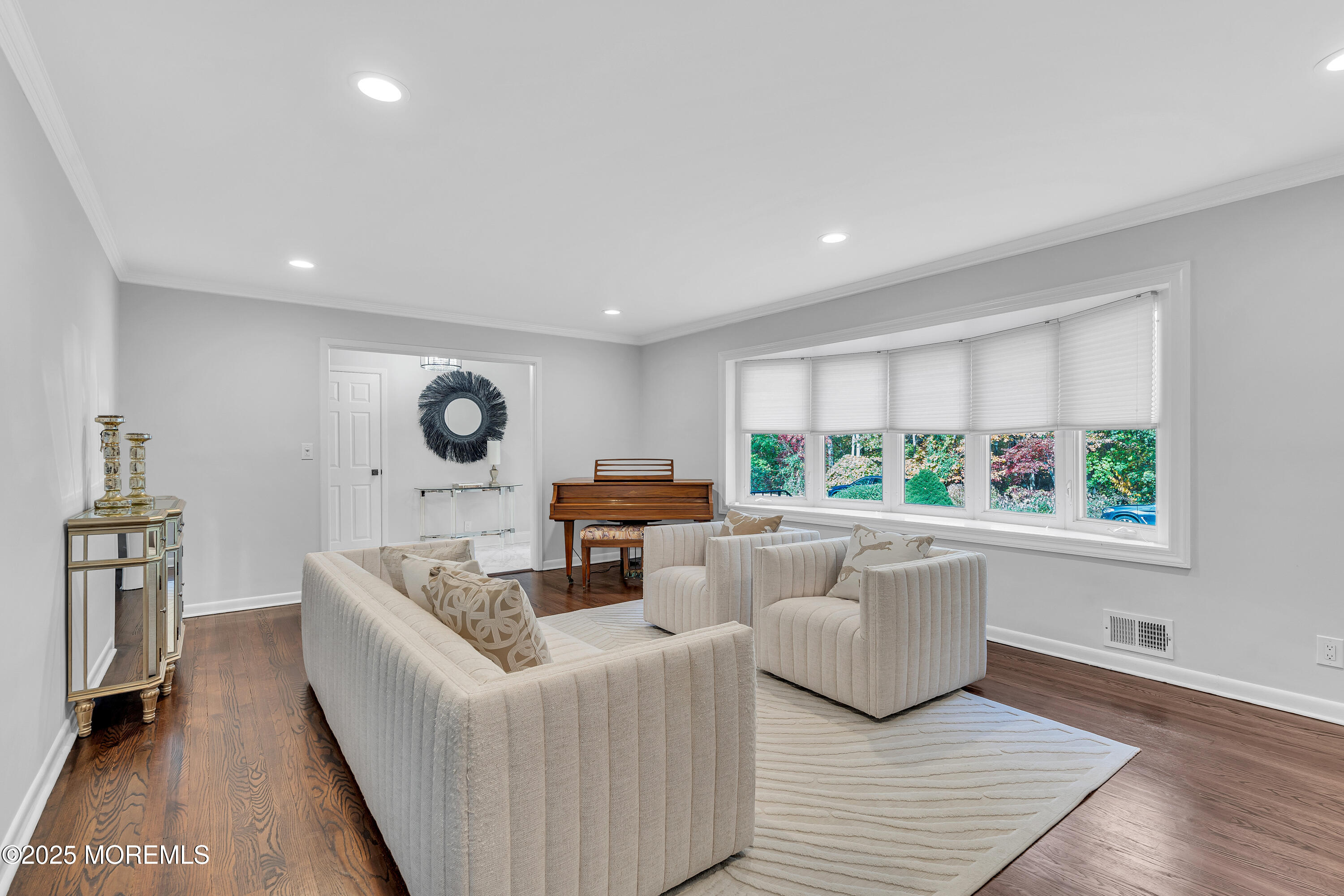 67 Beverly Road Springfield, NJ 07081 - Photo 9 of 46 a living room with furniture and a large window