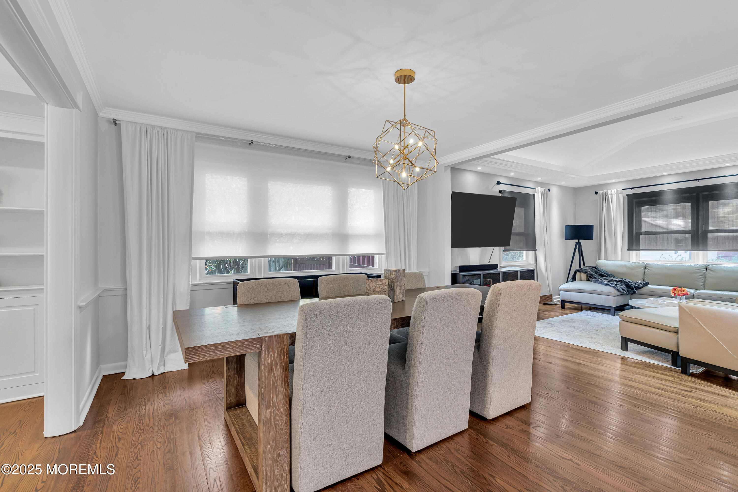 67 Beverly Road Springfield, NJ 07081 - Photo 10 of 46 a living room with fireplace furniture and a flat screen tv
