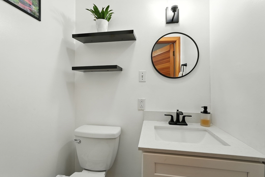 178 West Pomeroy Lane Amherst, MA 01002 - Photo 11 of 34 a bathroom with a toilet and a sink