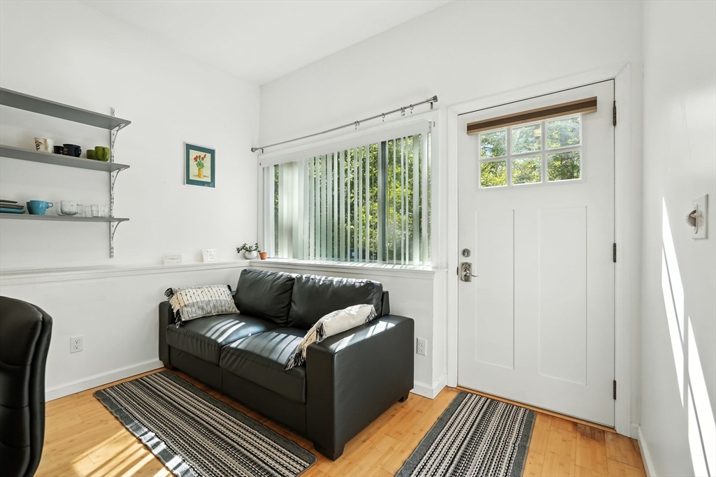 178 West Pomeroy Lane Amherst, MA 01002 - Photo 23 of 34 a living room with furniture and a window
