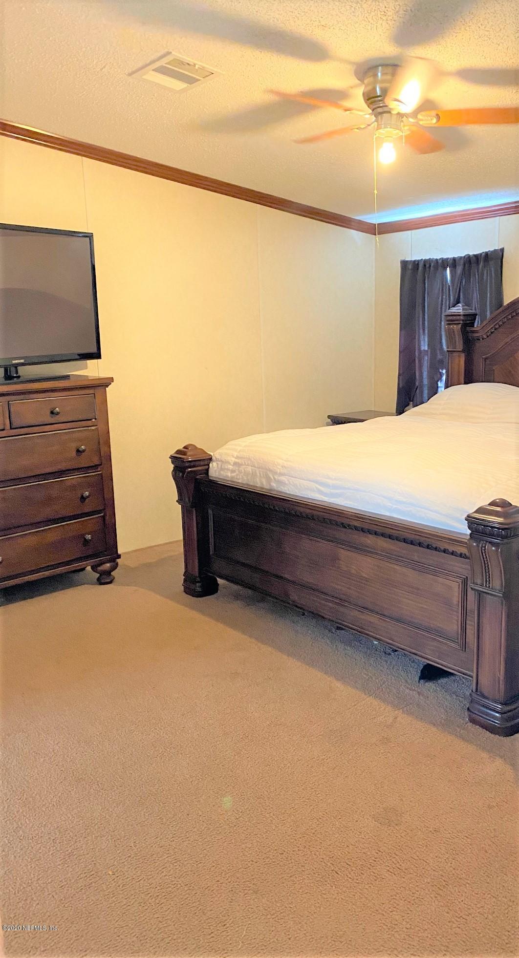 6780 Spring Lake Village Road Keystone Heights, FL 32656 - Photo 12 of 53 Master Bedroom