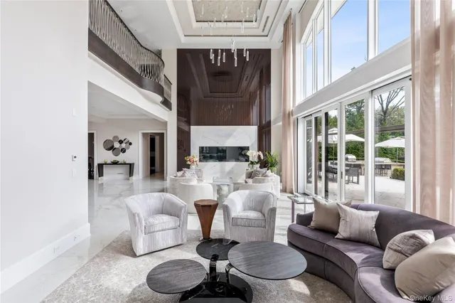 a view of a dining room with furniture wooden floor and chandelier
