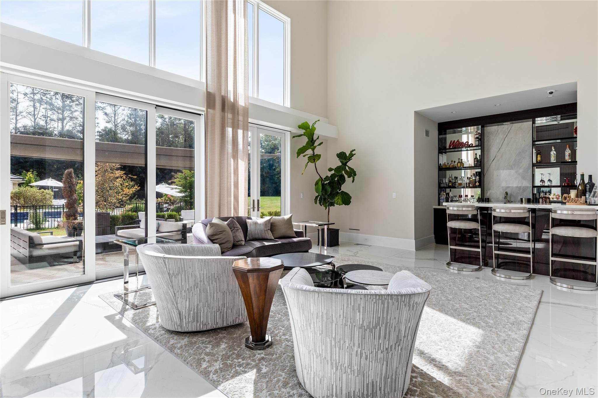 53 Simonson Road Glen Head, NY 11545 - Photo 13 of 43 a living room with furniture and large windows