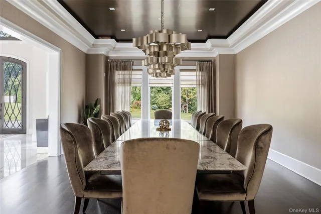 a kitchen with lots of counter top space and wooden floor