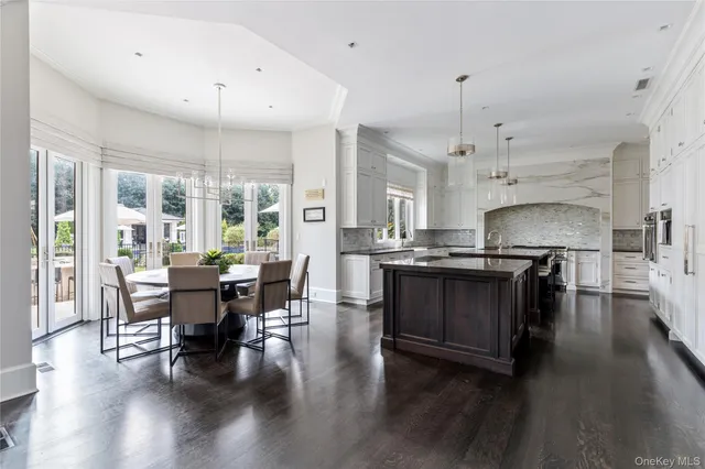 a spacious bedroom with bed and a large window