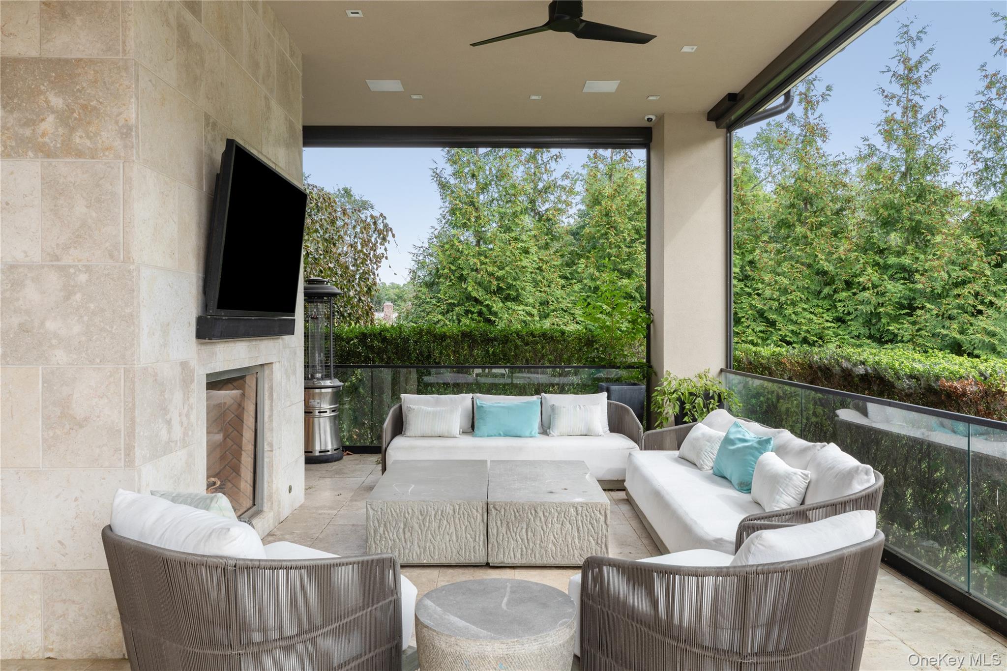 53 Simonson Road Glen Head, NY 11545 - Photo 38 of 43 a living room with couches and a flat screen tv