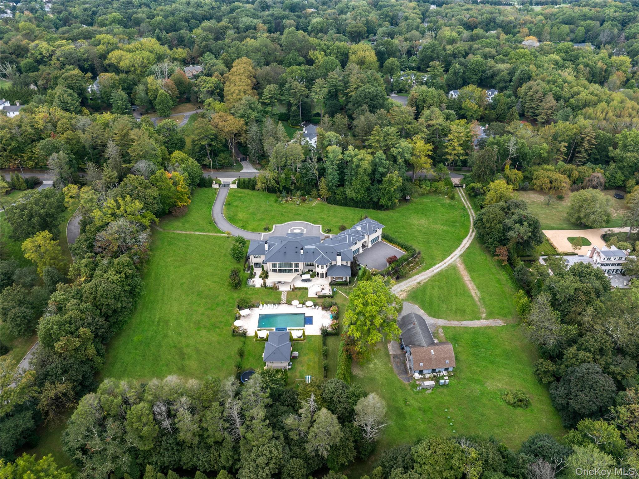 53 Simonson Road Glen Head, NY 11545 - Photo 43 of 43 an aerial view of a house with a garden