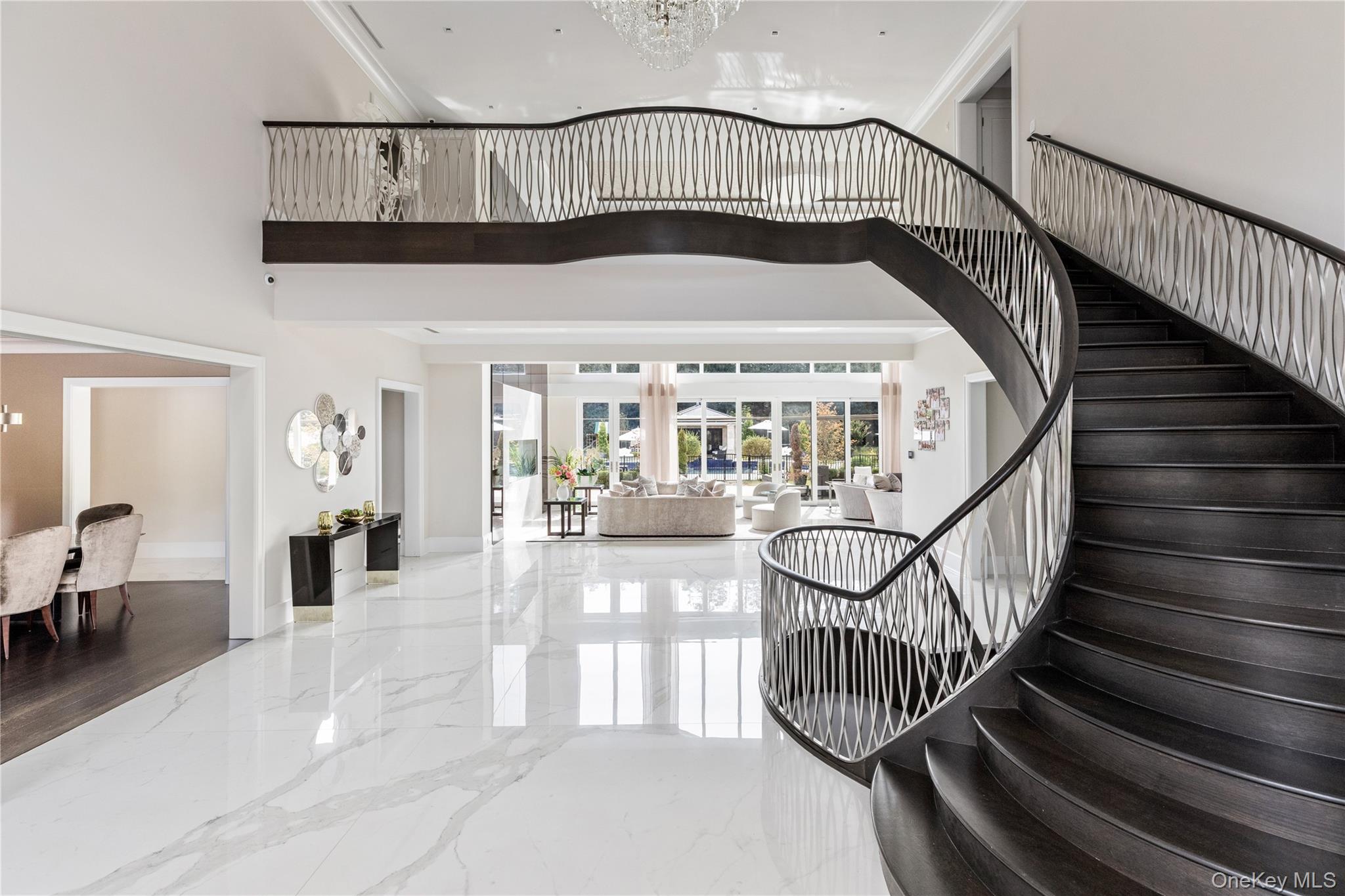 53 Simonson Road Glen Head, NY 11545 - Photo 7 of 43 a view of entryway bedroom and hall with wooden floor