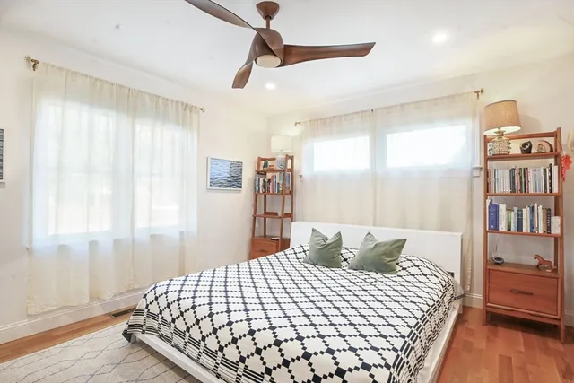 a bedroom with a bed and a cabinets