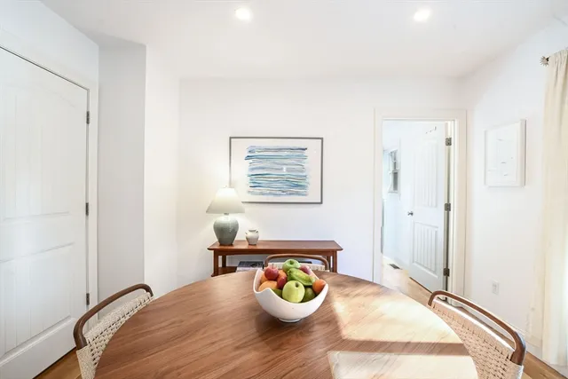 a bedroom with a bed and ceiling fan