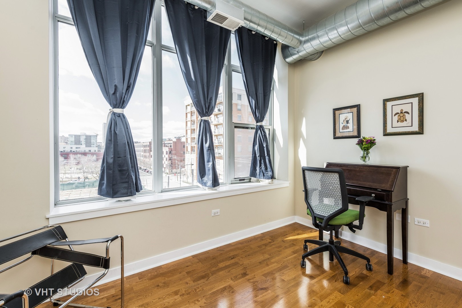 901 West Madison Street, Unit 407 Chicago, IL 60607 - Photo 7 of 11 a view of a workspace with furniture and a window