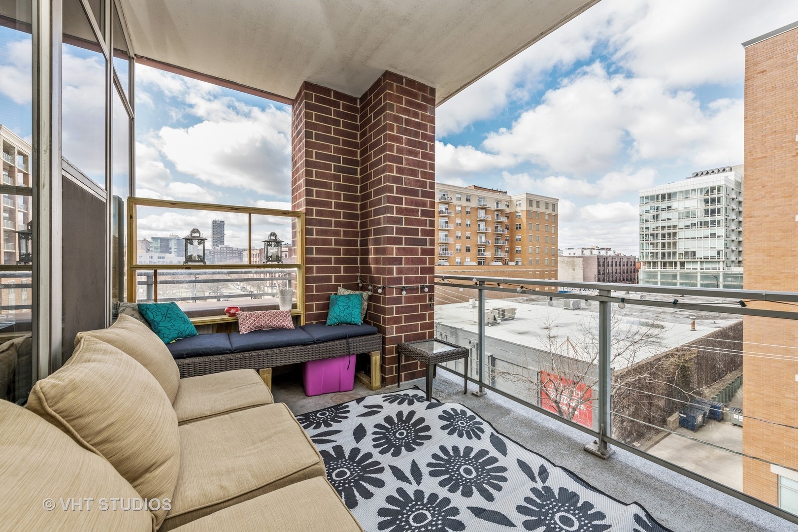 901 West Madison Street, Unit 407 Chicago, IL 60607 - Photo 9 of 11 a balcony view with a couch
