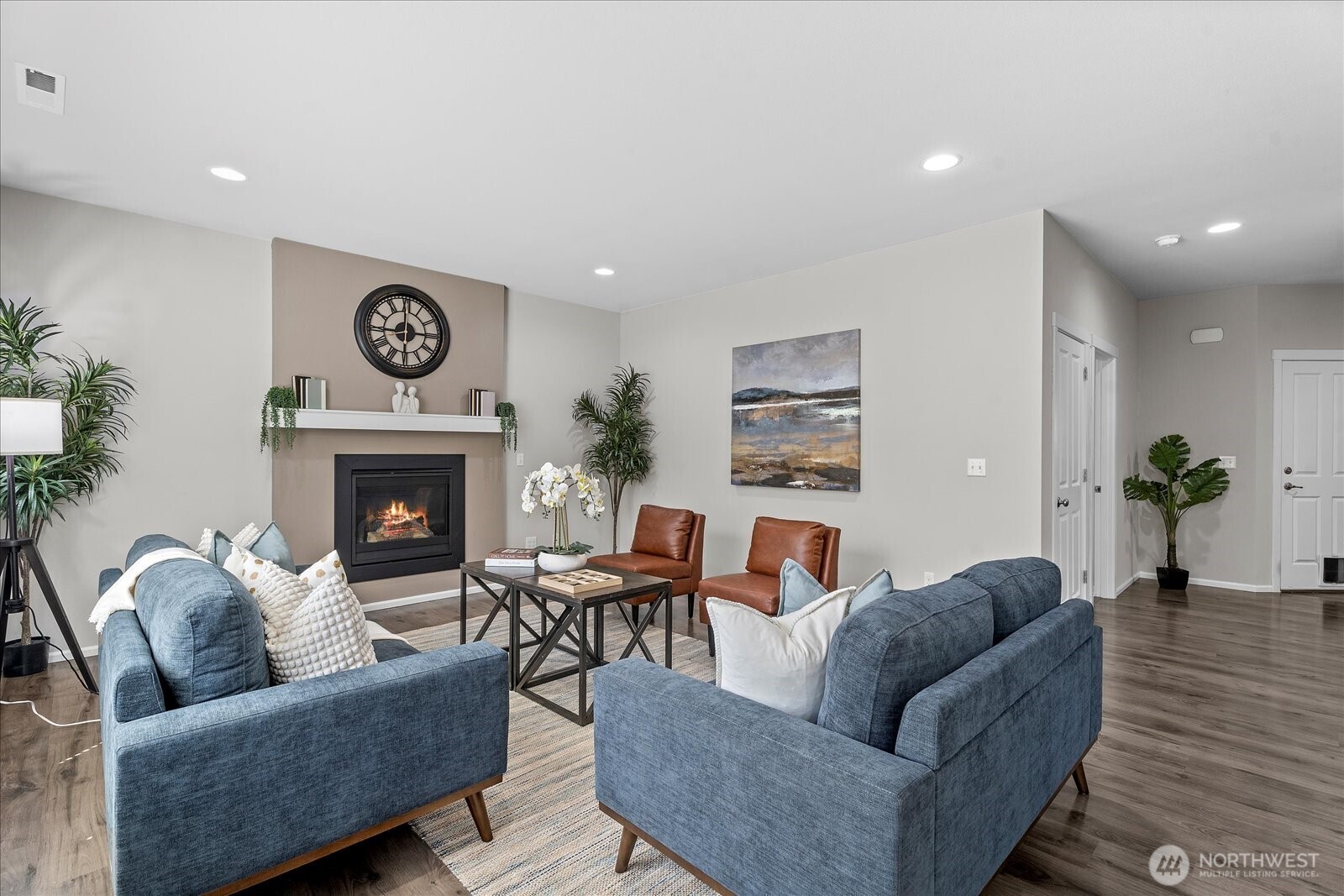 9901 13th Street Southeast Lake Stevens, WA 98258 - Photo 4 of 39 a living room with furniture and a fireplace