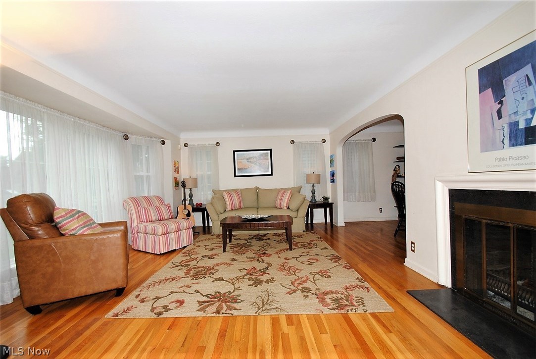 2555 Milton Road Cleveland, OH 44118 - Photo 2 of 14 Living Room with hardwood floors and fireplace.