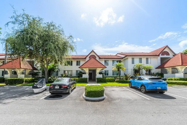 a car parked in front of a house