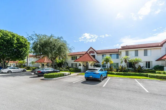 a car parked in front of a house
