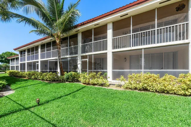 a view of a house with a garden