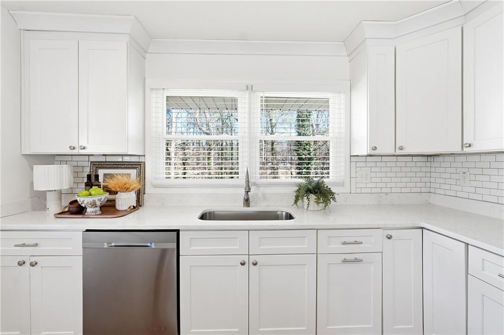 2629 Henderson Road Tucker, GA 30084 - Photo 7 of 31 a kitchen with a sink and a window