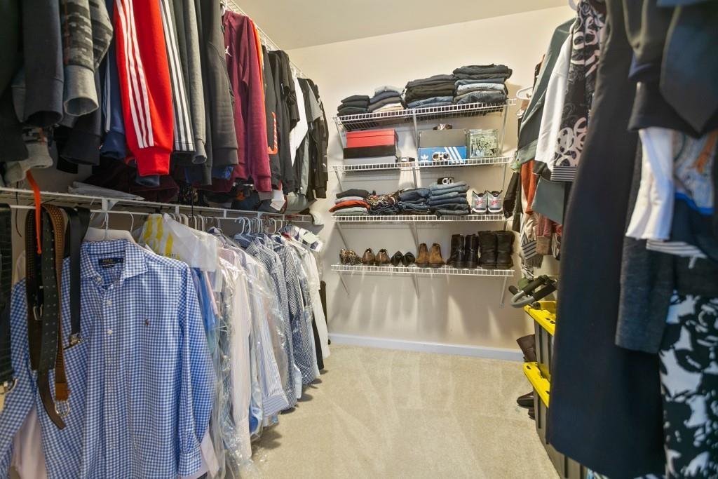 541 Battleview Drive Smyrna, GA 30082 - Photo 18 of 25 a view of walk in closet with clothes and shoes