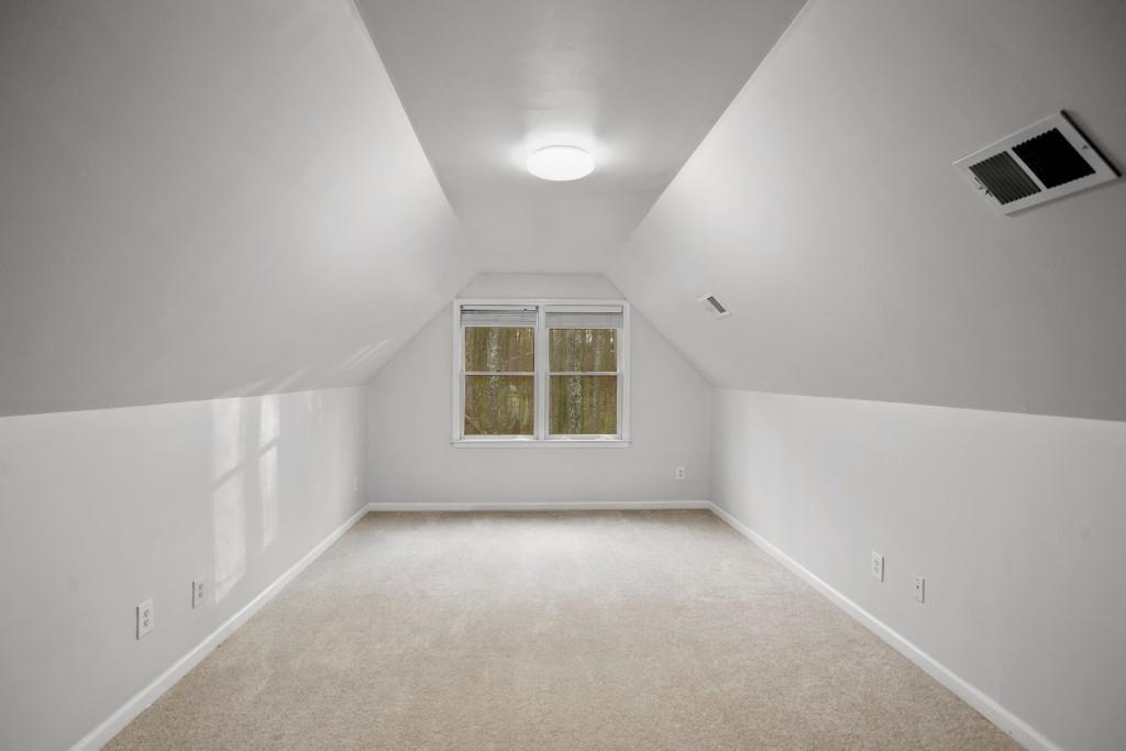 541 Battleview Drive Smyrna, GA 30082 - Photo 22 of 25 an empty room with windows
