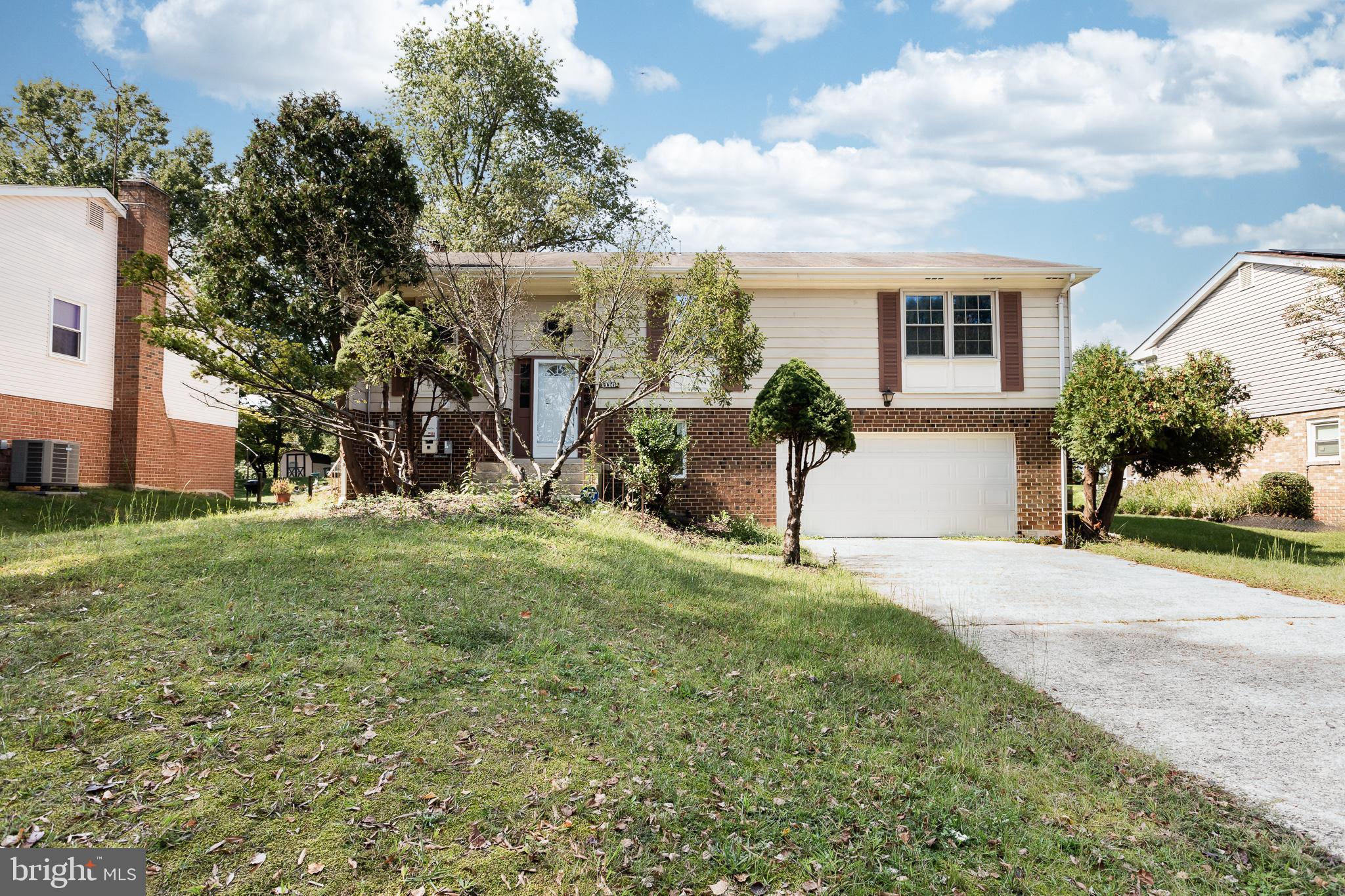 1116 Kings Tree Drive Bowie, MD 20721 - Photo 8 of 15 a view of a house with backyard and a tree