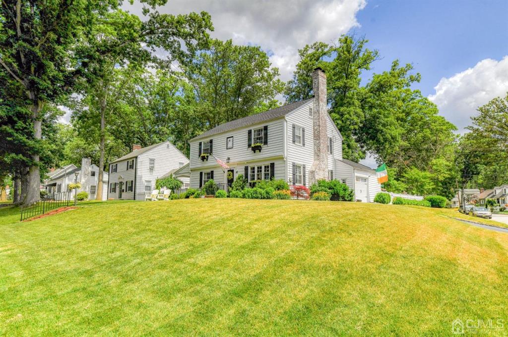 a house with trees in front of it