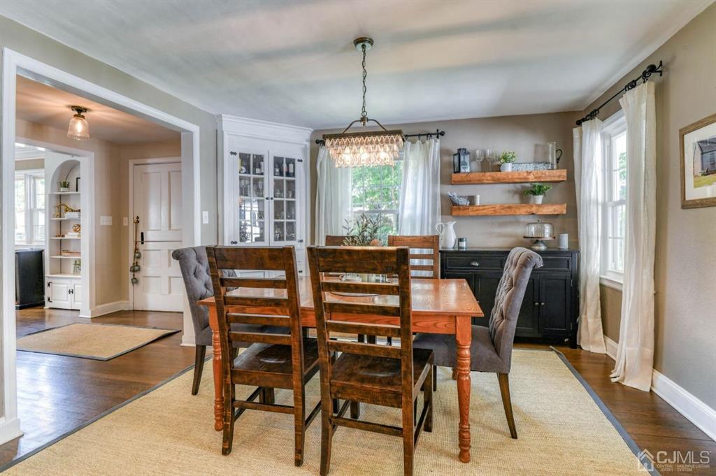 87 Chestnut Street Milltown, NJ 08850 - Photo 12 of 51 a dining room with furniture window wooden floor
