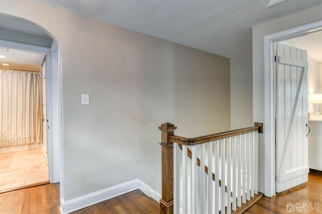 87 Chestnut Street Milltown, NJ 08850 - Photo 26 of 51 a view of a hallway with a window
