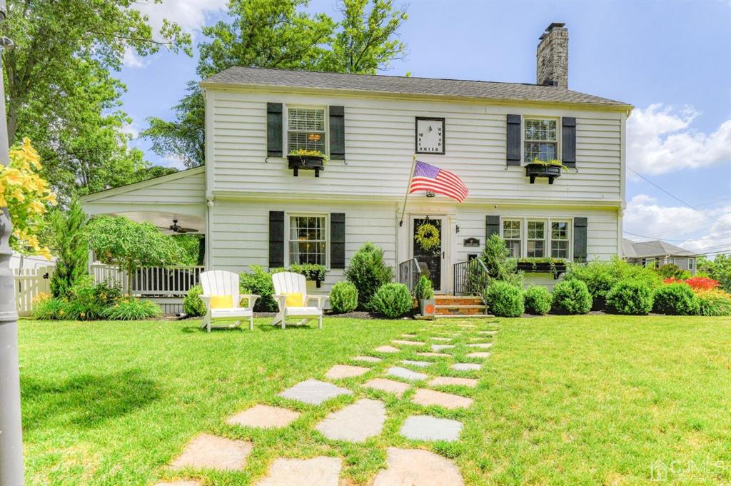 87 Chestnut Street Milltown, NJ 08850 - Photo 3 of 51 a front view of house with yard and green space
