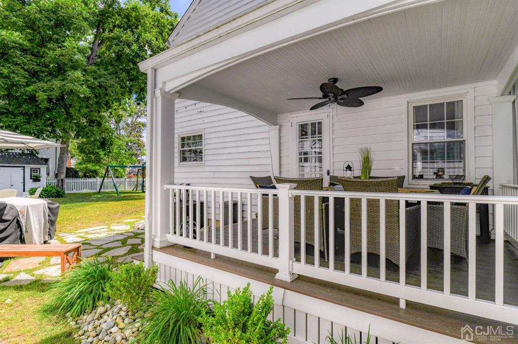 87 Chestnut Street Milltown, NJ 08850 - Photo 38 of 51 a view of a house with backyard porch and furniture