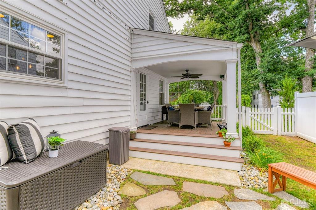 87 Chestnut Street Milltown, NJ 08850 - Photo 39 of 51 a view of a chair and tables in the patio