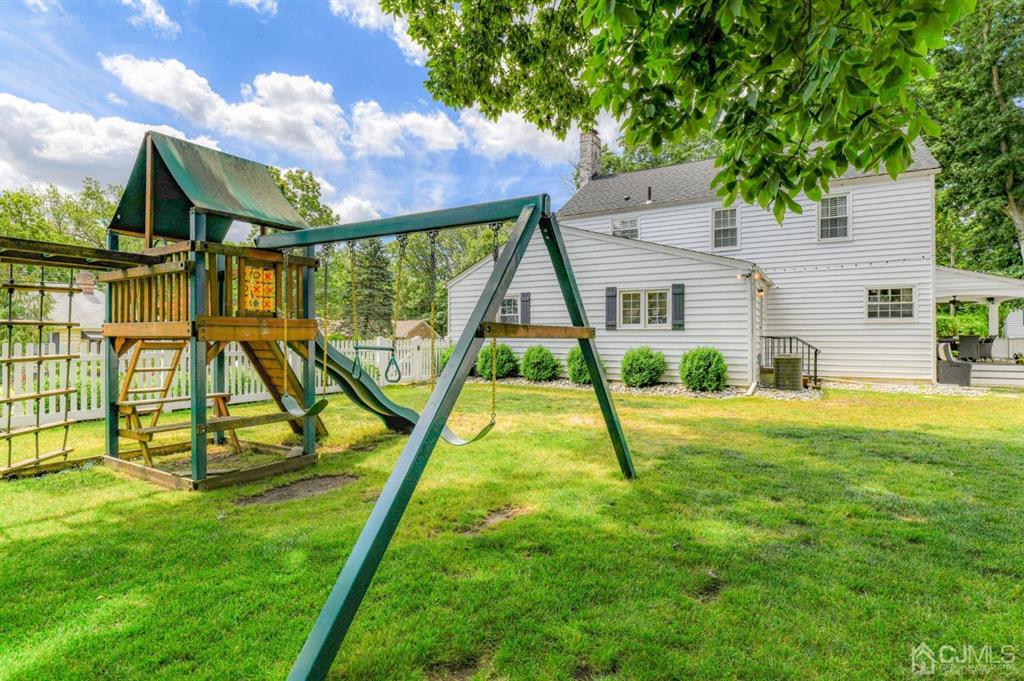 87 Chestnut Street Milltown, NJ 08850 - Photo 42 of 51 a view of a house with pool