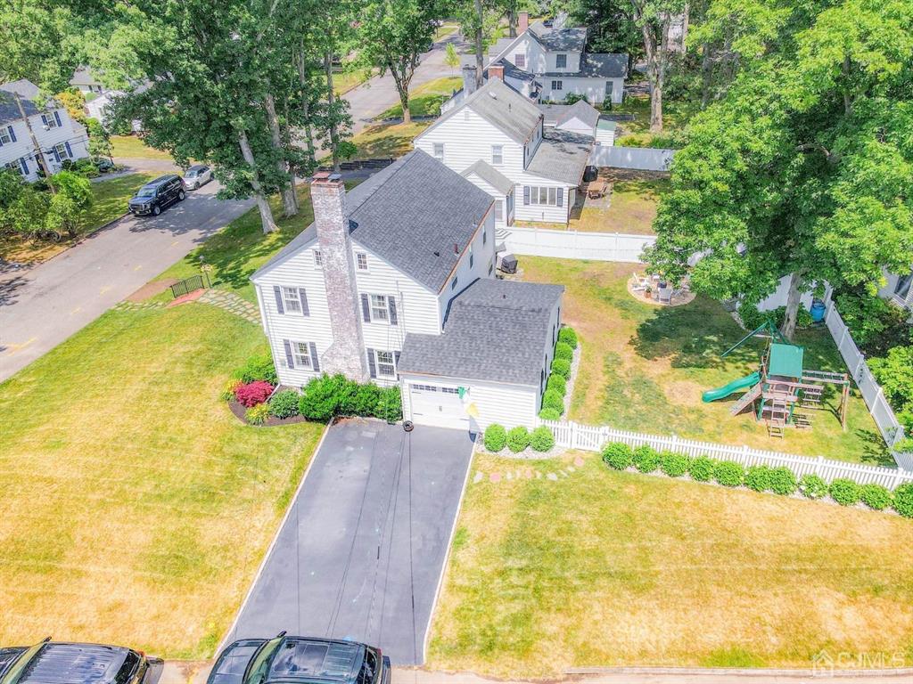 87 Chestnut Street Milltown, NJ 08850 - Photo 45 of 51 a front view of a house with a yard