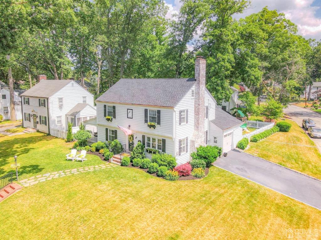 87 Chestnut Street Milltown, NJ 08850 - Photo 46 of 51 a view of a house with pool and garden
