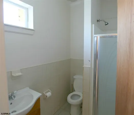 a bathroom with a sink and toilet